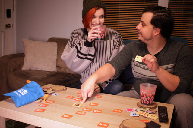 Adults Playing Pick Up Locks Two adults playing Pick Up Locks.